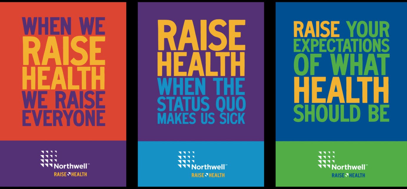 Orange poster for Northwell that reads “When we raise health, we raise everyone.”